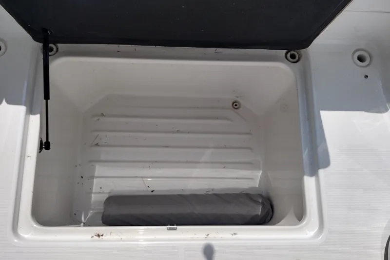 Slide: The Image of Open storage compartment in 2026 Formula 350 Crossover Bowrider boat. - 59