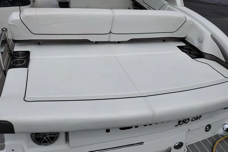 Slide: The Image of 2026 Formula 350 Crossover Bowrider, featuring spacious white seating and integrated cup holders. - 60