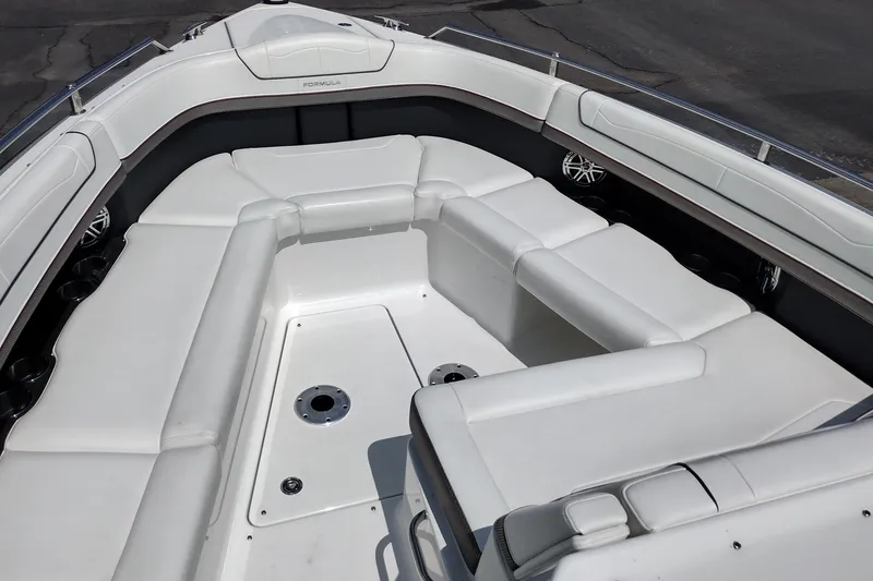 Slide: The Image of 2026 Formula 350 Crossover Bowrider with spacious white seating and sleek design. - 16