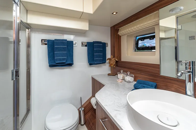 Slide: The Image of Luxurious 2023 Sirena Flybridge yacht bathroom with modern fixtures and elegant design. - 47