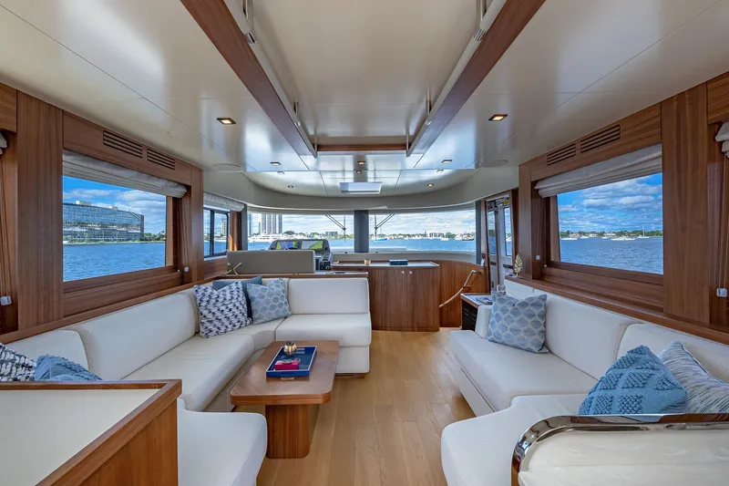 Slide: The Image of Luxurious interior of 2023 Sirena Flybridge yacht with elegant seating and scenic water views. - 35