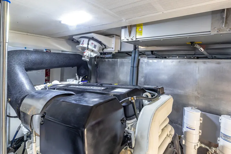 Slide: The Image of Engine room of 2023 Sirena Flybridge yacht, showcasing modern machinery and components. - 60
