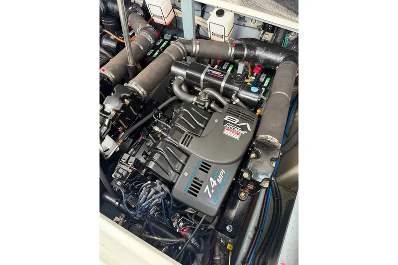 Slide: The Image of Engine compartment of a 2000 Sea Ray 340 Sundancer with 7.4L MPI V8 engine. - 23