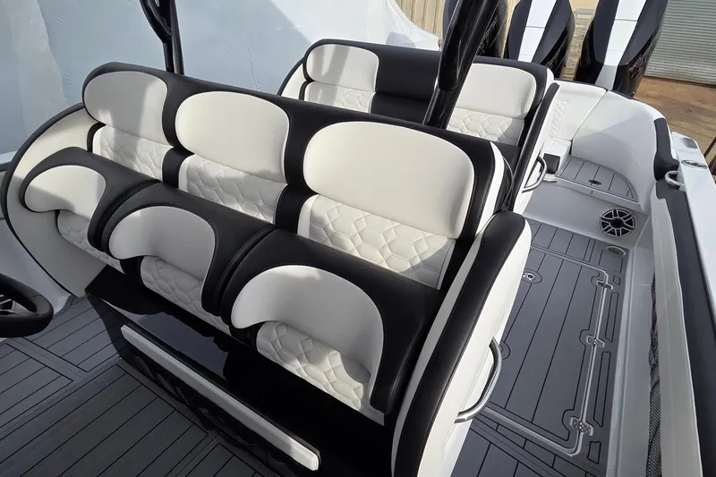 Slide: The Image of 2026 Nor-Tech 390 Sport Center Console with luxurious seating and modern design. - 9