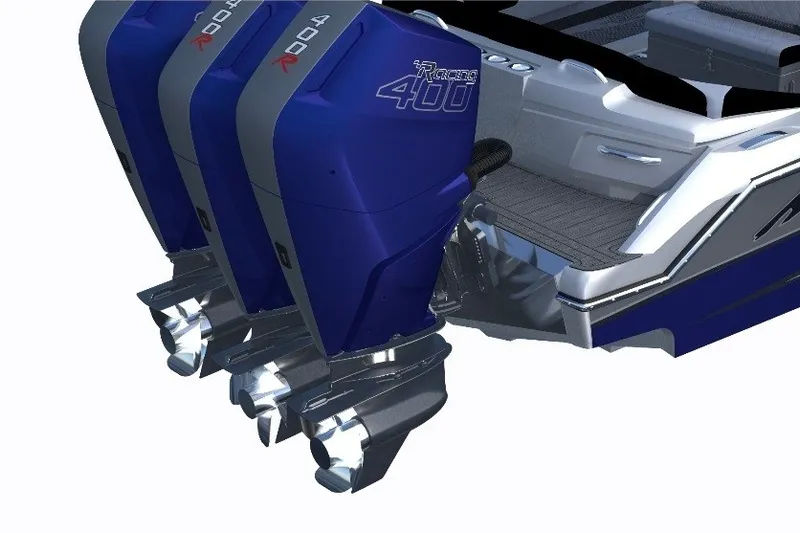 Slide: The Image of 2027 Nor-Tech 390 Sport boat with triple blue outboard engines. - 2