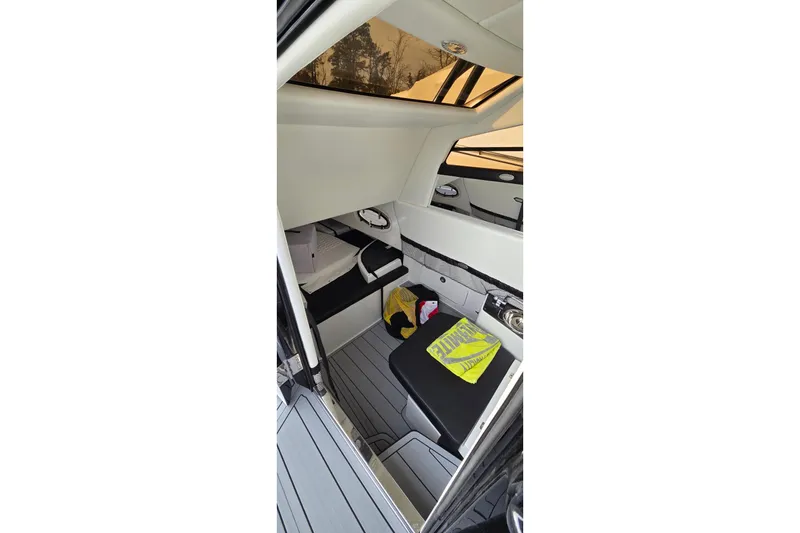 Slide: The Image of Interior of 2026 Nor-Tech 390 Sport Center Console, featuring sleek design and modern amenities. - 10
