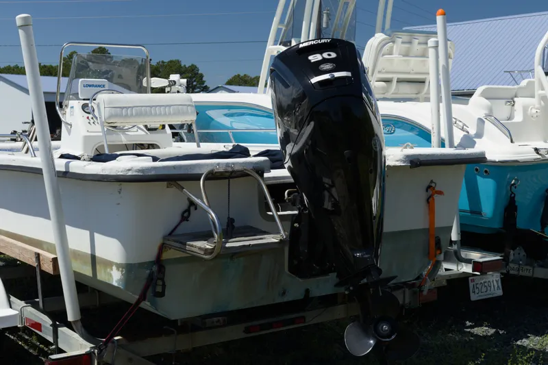 Slide: The Image of Seapro 1996 Skiff boat with Mercury 90 engine on trailer, 2006 model. - 2