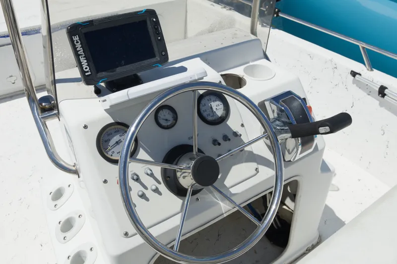 Slide: The Image of Steering console of a 2006 Seapro 1996 Skiff with Lowrance navigation system. - 9