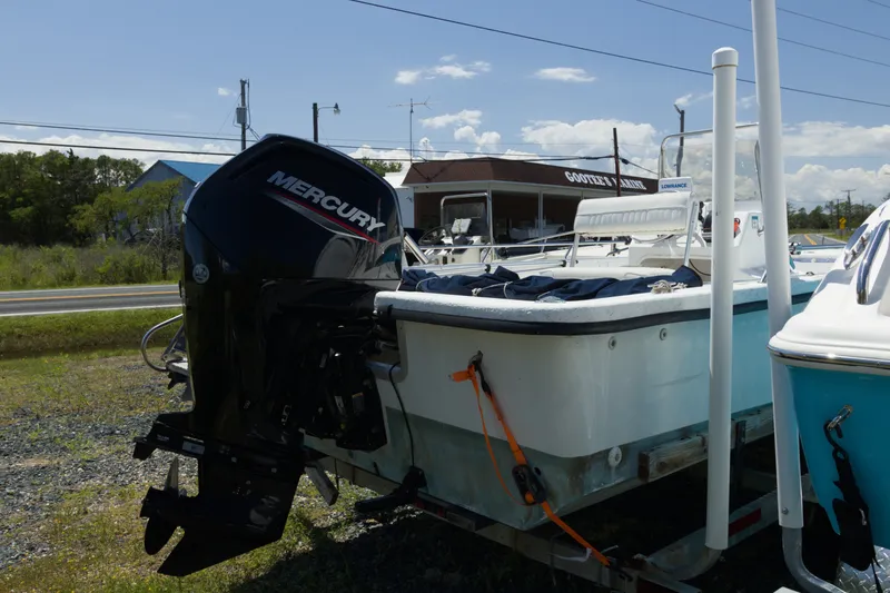 Slide: The Image of 2006 Seapro 1996 Skiff with Mercury outboard motor on trailer. - 3