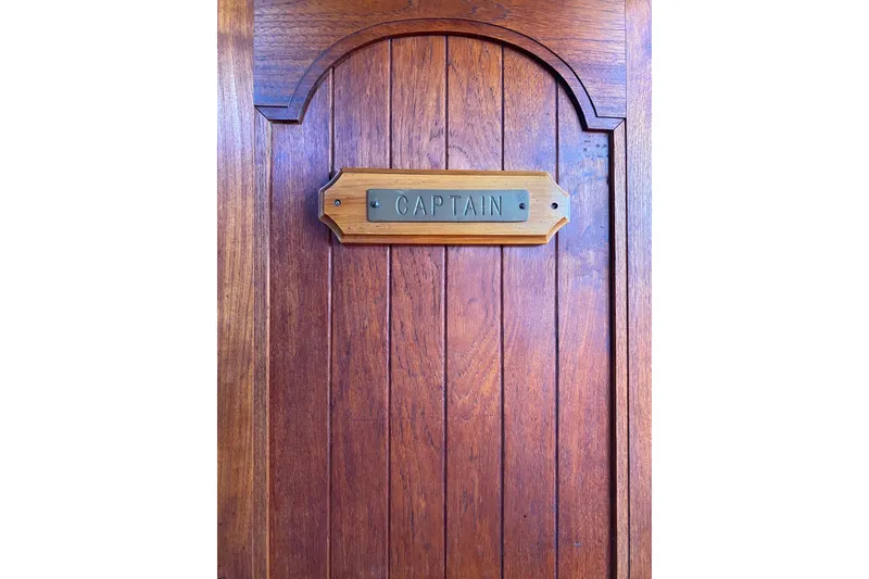 Slide: The Image of Wooden door with "Captain" plaque, CT 48 model, 1976 vintage design. - 16