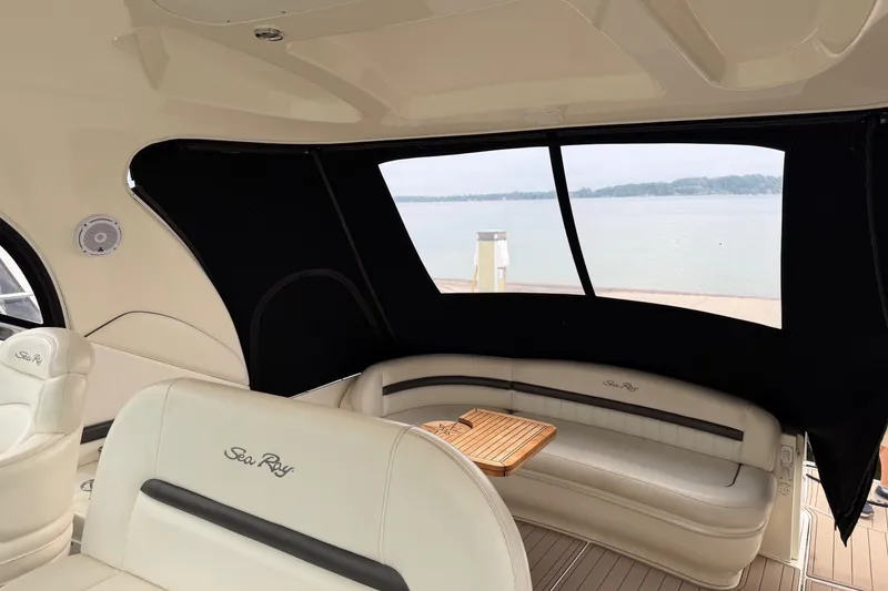 Slide: The Image of Interior of 2005 Sea Ray 420 Sundancer yacht with elegant seating and scenic water view. - 3