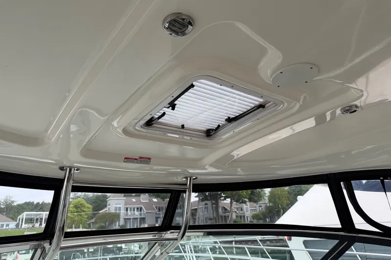 Slide: The Image of Ceiling view of 2005 Sea Ray 420 Sundancer with hatch and windows. - 9