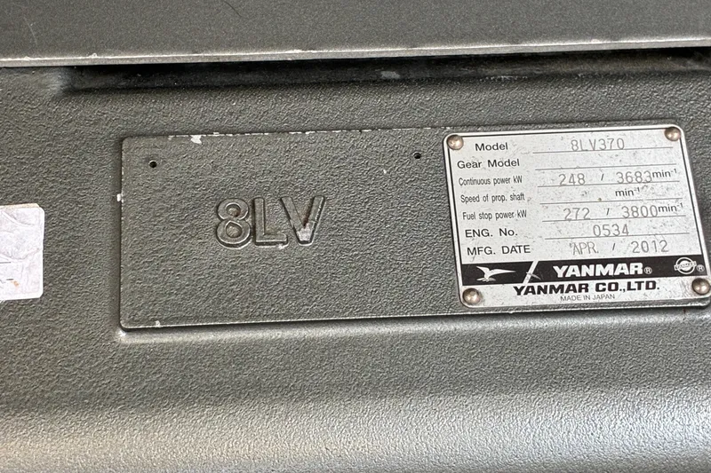 Slide: The Image of Yanmar engine plate on 2014 Hinckley Picnic Boat 37 MKIII, model 8LV370, manufactured April 2012. - 48