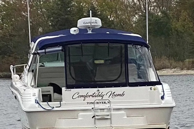 Slide: The Image of 1992 Sea Ray 400 Express Cruiser named "Comfortably Numb" docked at Toms River. - 3