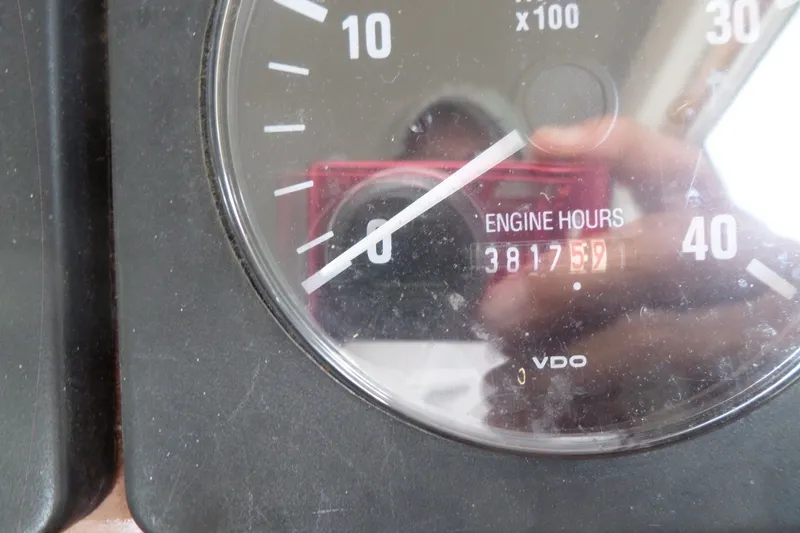 Slide: The Image of Close-up of Mainship 350 Trawler 1997 engine hour meter showing 3817.59 hours. - 51