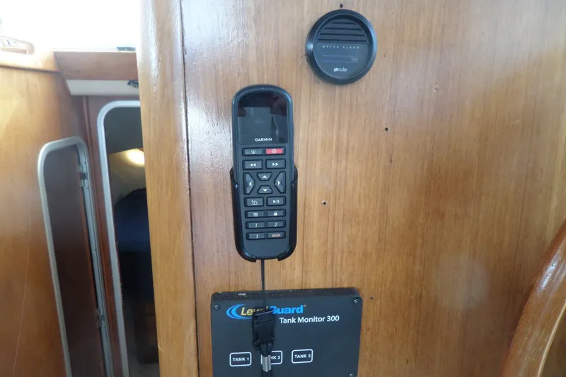 Slide: The Image of Interior of 1997 Mainship 350 Trawler with Garmin remote and tank monitor. - 47