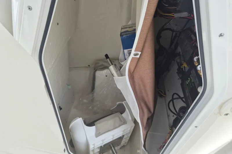 Slide: The Image of Interior view of 2026 Key West 230 Bay Reef boat storage compartment. - 17