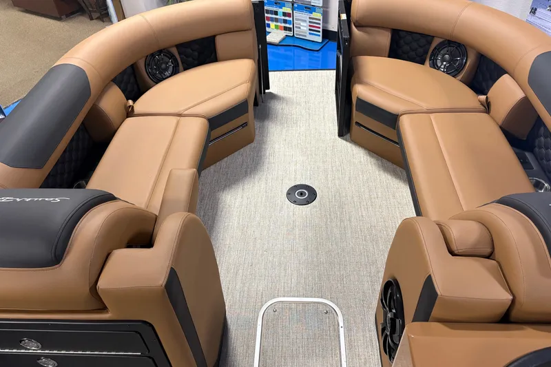 Slide: The Image of Luxurious interior of 2027 South Bay 525UL pontoon boat with tan leather seating. - 3