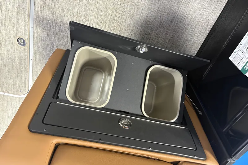 Slide: The Image of Built-in storage compartments in 2027 South Bay 525UL boat interior. - 14