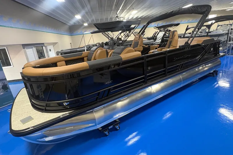 Slide: The Image of 2027 South Bay 525UL pontoon boat with sleek design and luxurious seating. - 1
