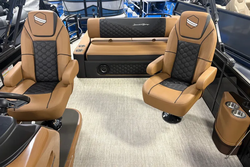 Slide: The Image of Luxurious interior of 2027 South Bay 525UL boat with plush seating and modern design. - 13