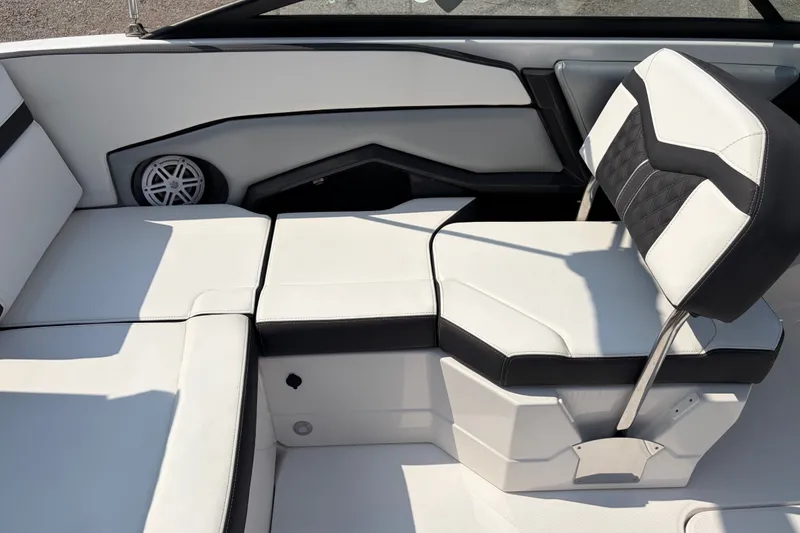 Slide: The Image of 2024 Monterey 215SS Super Sport boat interior with white and black seating. - 20