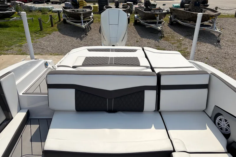 Slide: The Image of 2024 Monterey 215SS Super Sport boat interior with luxurious seating and modern design. - 21