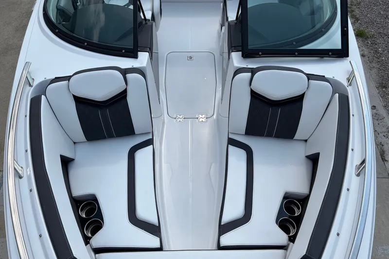 Slide: The Image of 2024 Monterey 215SS Super Sport boat interior with sleek seating and cup holders. - 13