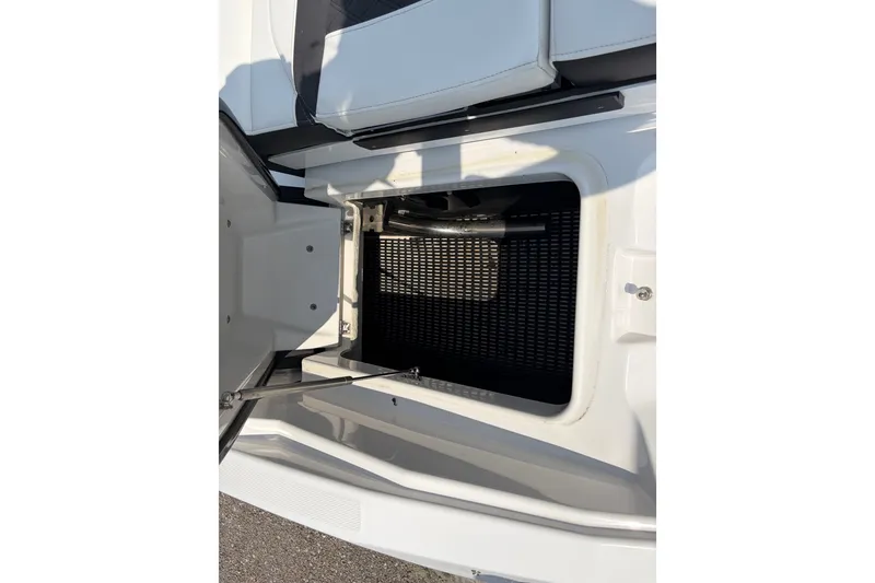 Slide: The Image of Open storage compartment on 2024 Monterey 215SS Super Sport boat, showcasing interior details. - 24
