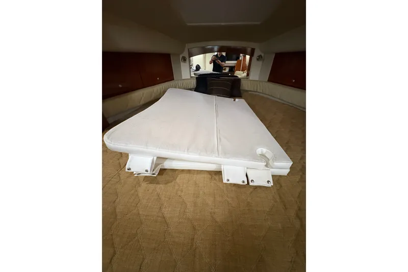 Slide: The Image of Interior cabin of 2006 Sea Ray 340 Sundancer with bed and cushions. - 39