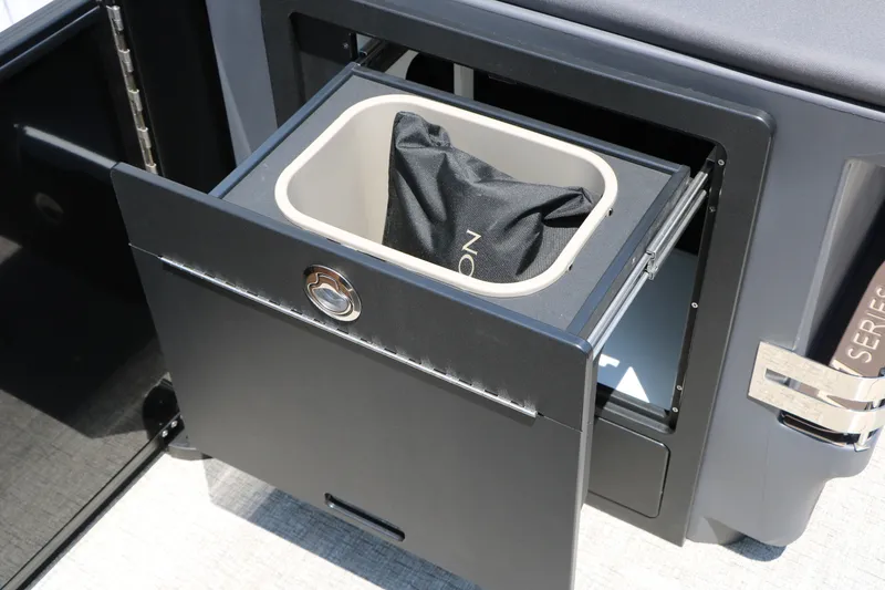 Slide: The Image of Pull-out storage drawer in 2026 Bennington 22MFB boat, featuring sleek design and functionality. - 29