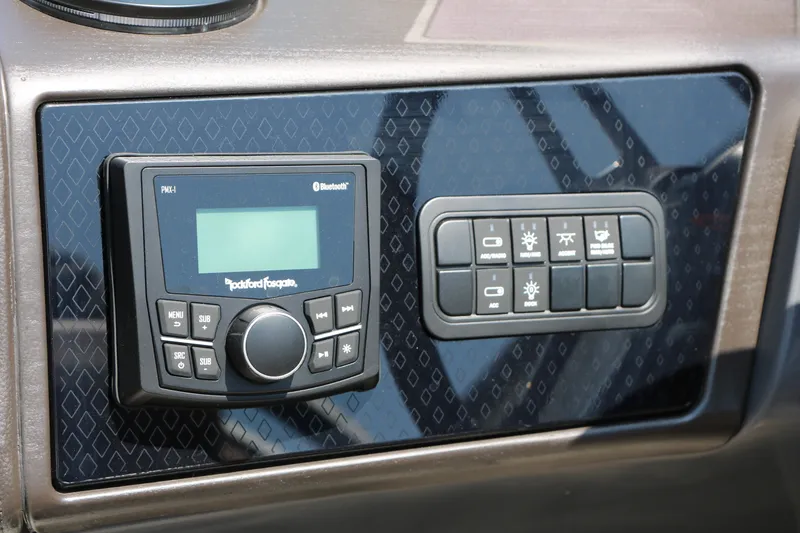 Slide: The Image of Control panel of 2026 Bennington 22MFB boat with Rockford Fosgate audio system. - 34