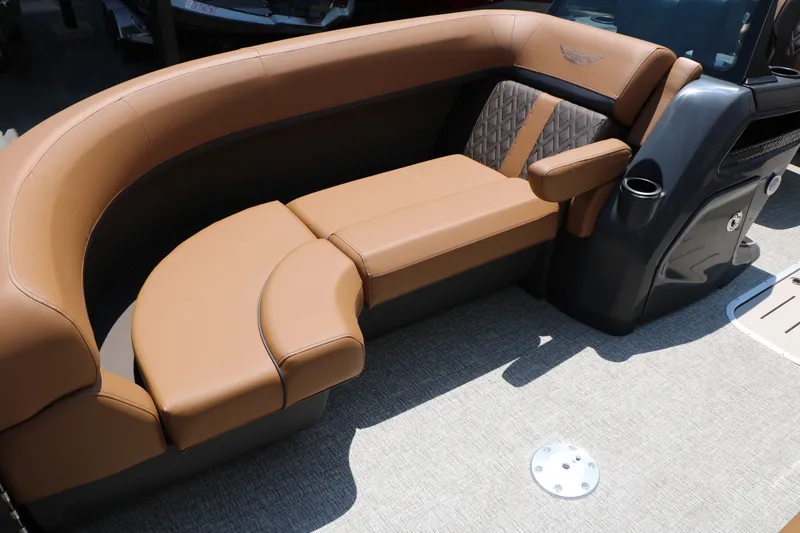 Slide: The Image of Luxurious seating on 2026 Bennington 22MFB boat, featuring elegant brown upholstery and modern design. - 25