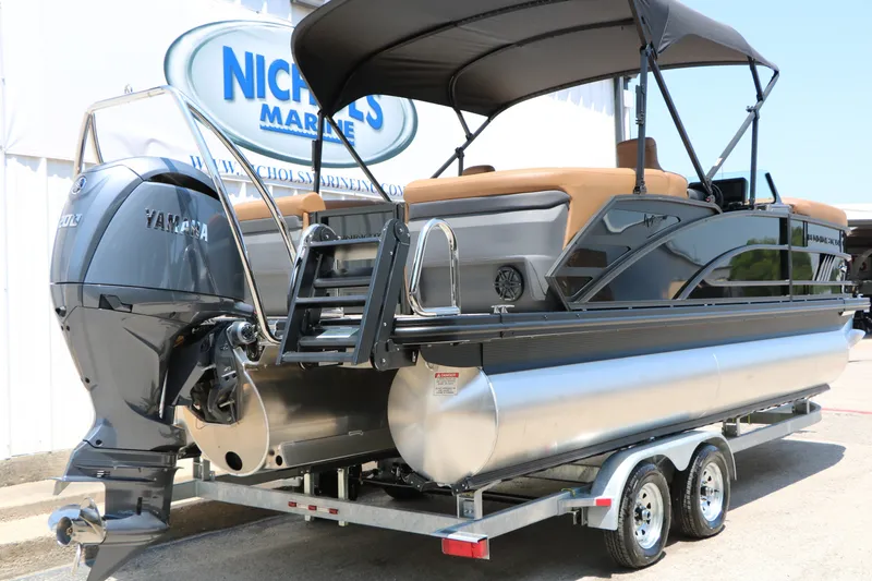 Slide: The Image of 2026 Bennington 22MFB pontoon boat with Yamaha engine on trailer at Nichols Marine. - 14