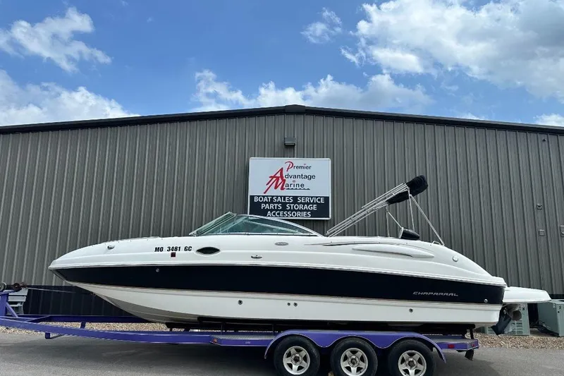 Slide: The Image of 2005 Chaparral Sunesta 274 boat on trailer at marine service center. - 0