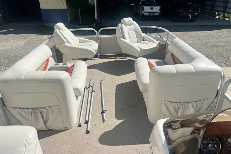 Slide: The Image of 2006 Princecraft Versailles 22 LP-SS pontoon boat interior with white seating and accessories. - 8