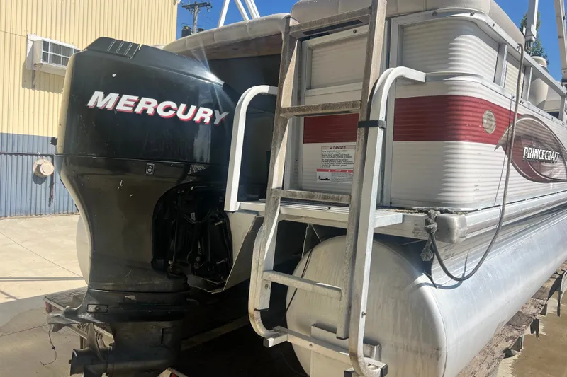 Slide: The Image of 2006 Princecraft Versailles 22 LP-SS pontoon boat with Mercury outboard motor. - 3