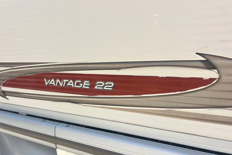 Slide: The Image of Side view of a 2006 Princecraft Versailles 22 LP-SS boat with "Vantage 22" decal. - 14