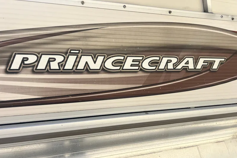 Slide: The Image of 2006 Princecraft Versailles 22 LP-SS boat logo on metallic surface. - 13
