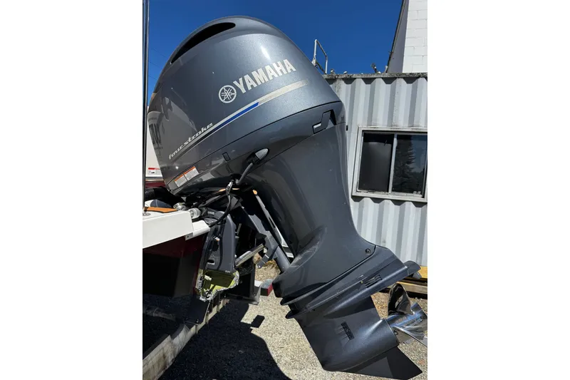 Slide: The Image of Outboard motor on a 2020 Ranger Tugs R-23 boat, featuring Yamaha branding. - 12