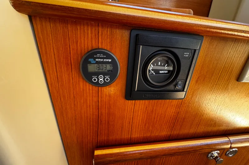 Slide: The Image of Control panel on 2020 Ranger Tugs R-23 boat with battery and water gauges. - 7
