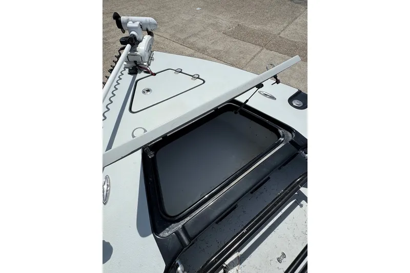 Slide: The Image of 2018 Blazer Bay 2420 GTS boat deck with open storage compartment. - 19