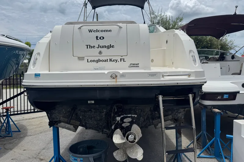 Slide: The Image of 2006 Sea Ray Sundancer 260 boat with "Welcome to The Jungle" text, Longboat Key, FL. - 22