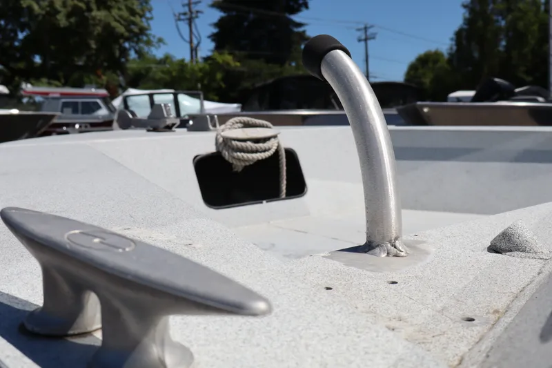 Slide: The Image of 2005 Jetcraft 1625 SK boat deck with cleat and rope detail. - 23
