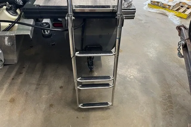 Slide: The Image of Stainless steel ladder on 2022 Angler Qwest 820XRE Cruise LT boat, indoor setting. - 4