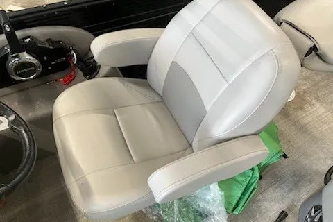 Slide: The Image of 2022 Angler Qwest 820XRE Cruise LT boat seat, featuring plush gray upholstery and ergonomic design. - 15