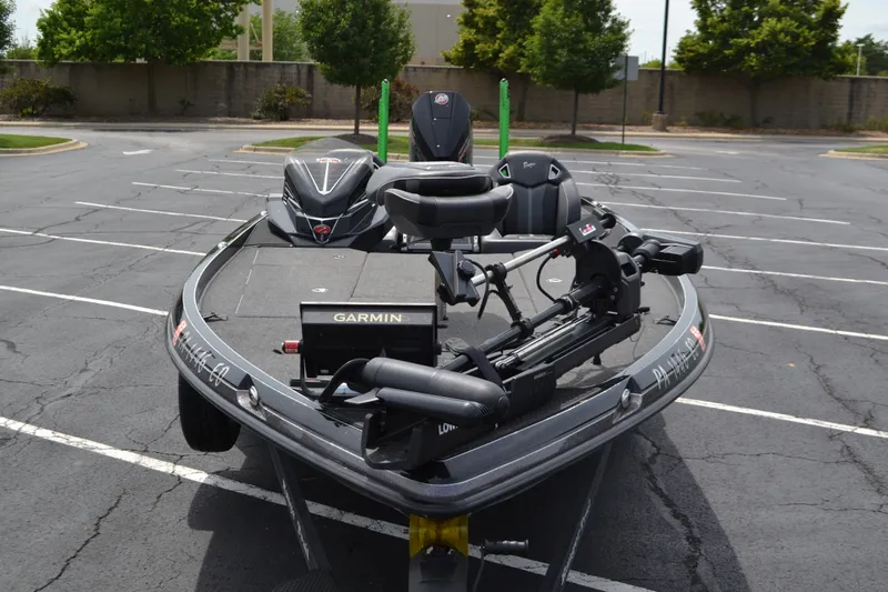 Slide: The Image of 2023 Ranger Z521R fishing boat with Garmin equipment in a parking lot. - 5