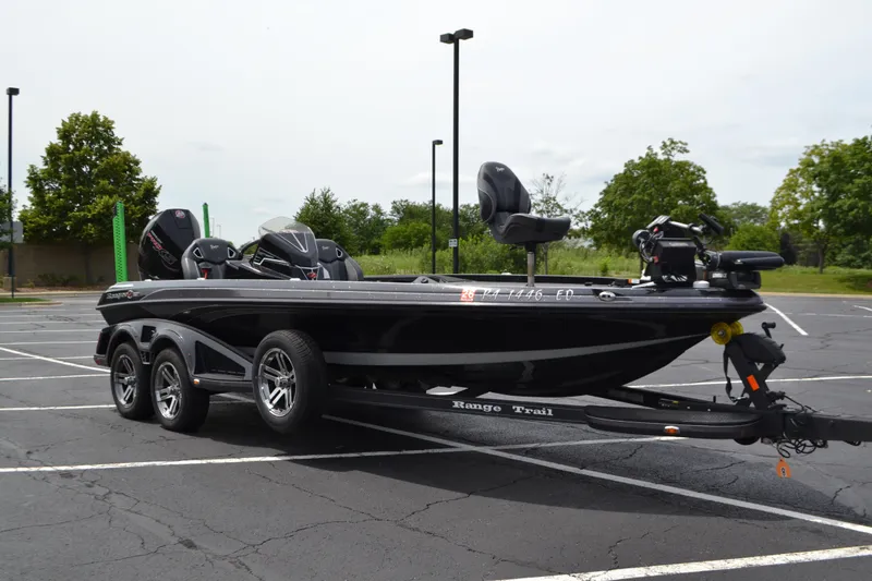 Slide: The Image of 2023 Ranger Z521R bass boat on trailer in parking lot, side view. - 3