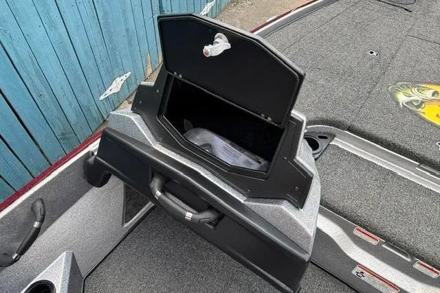 Slide: The Image of 2025 Nitro Z20 XL boat storage compartment open, revealing interior space. - 22