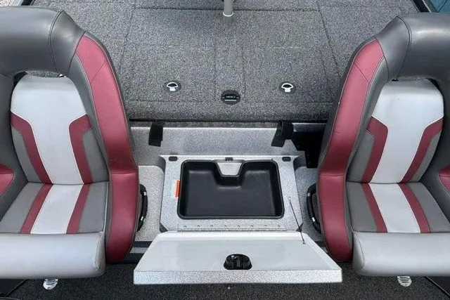 Slide: The Image of 2025 Nitro Z20 XL boat interior with dual seats and storage compartment. - 24